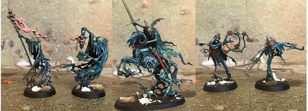 Photograph of a group of individual nighthaunt models, ghostly warriors painted a dark grey-green