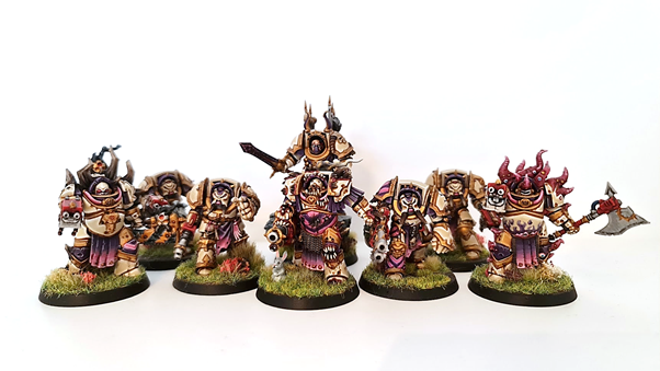 A photo showing the converted tainted cohort terminator models mixed into a standard unit of five chaos terminators. 