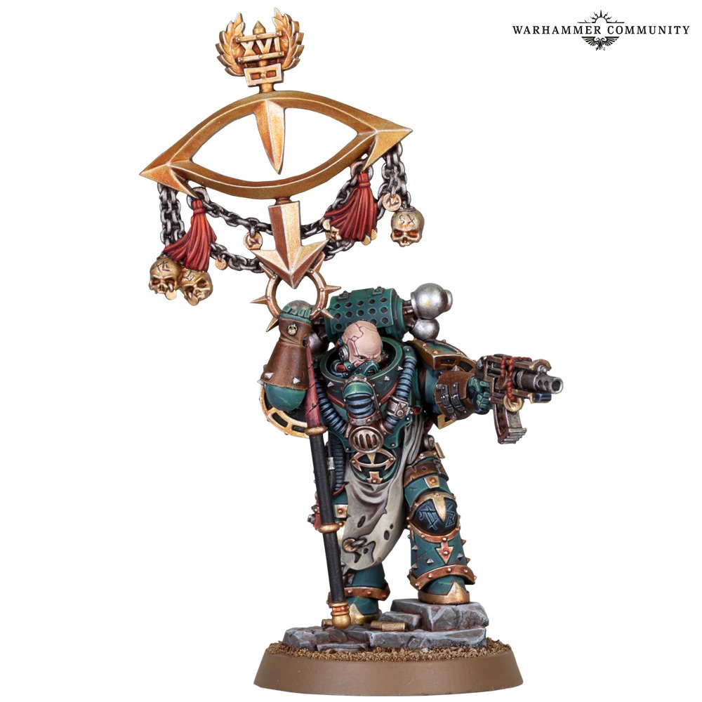 A model of a space marine in sea-green armour, carrying a banner with an icon of an eye.