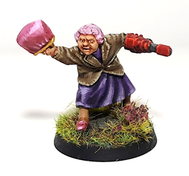 An image of the Danuta Danielson miniature, converted to be brandishing a las pistol in her off hand. 