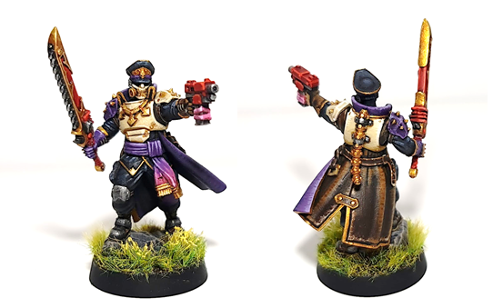 An image of a traitor guard captain carrying a bolt pistol and chainsword. 